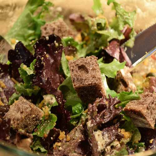 Vegan Oil Free Caesar Salad with Mixed Baby Greens and Vegan Parmesan Cheese