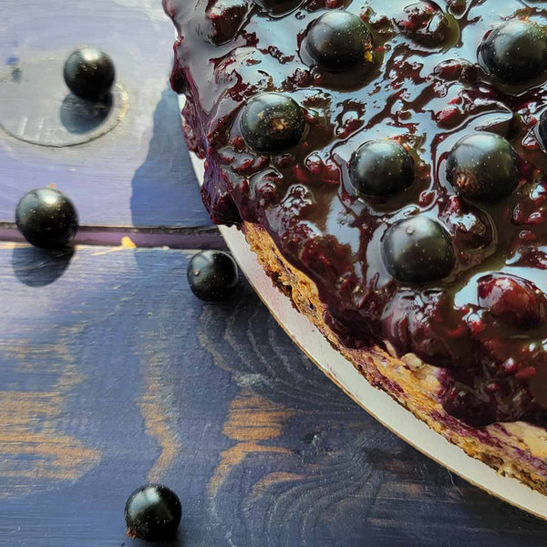Plant-based Cheesecake with Black Currant Coulis
